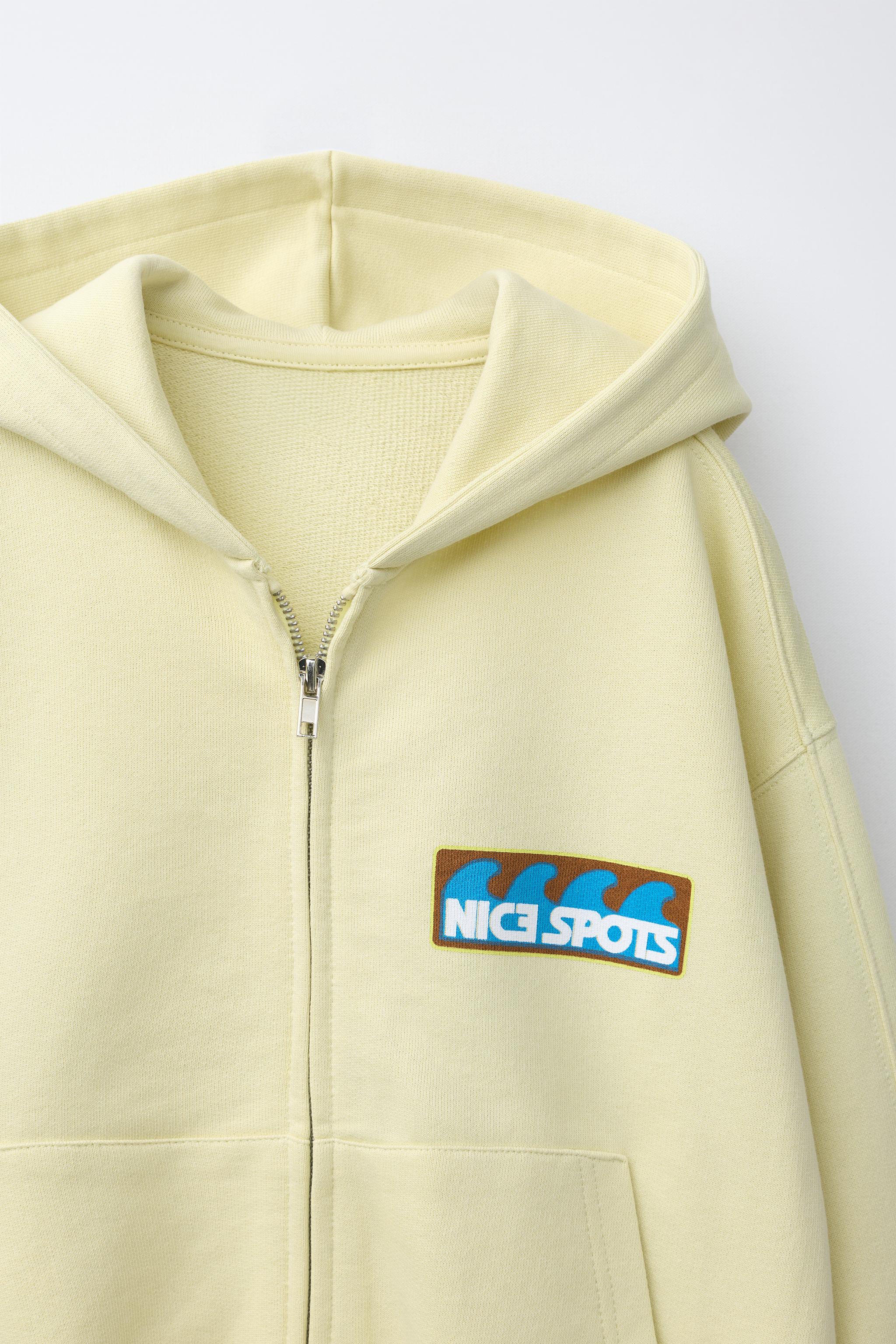 SWEAT ZIPPÉ IMPRIMÉ